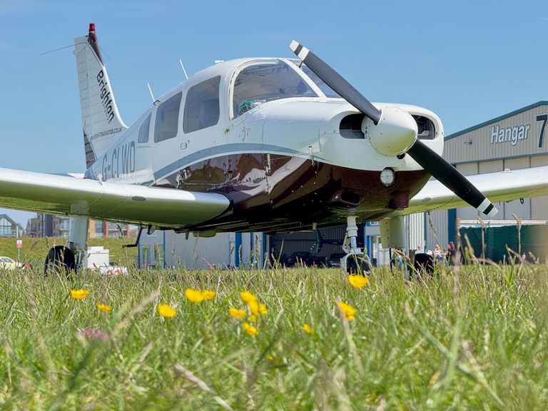 A front picture of a STAR flight training PA28 aircraft propeller