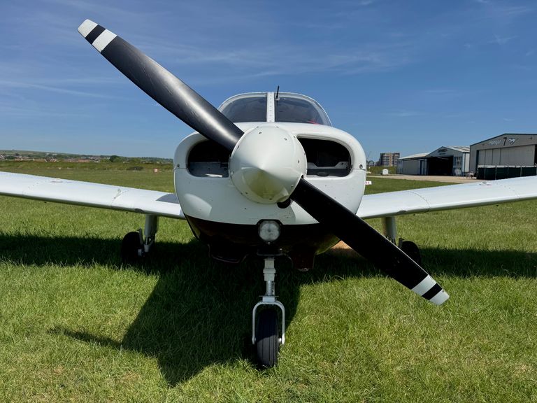 A front picture of a STAR flight training PA28 aircraft propeller
