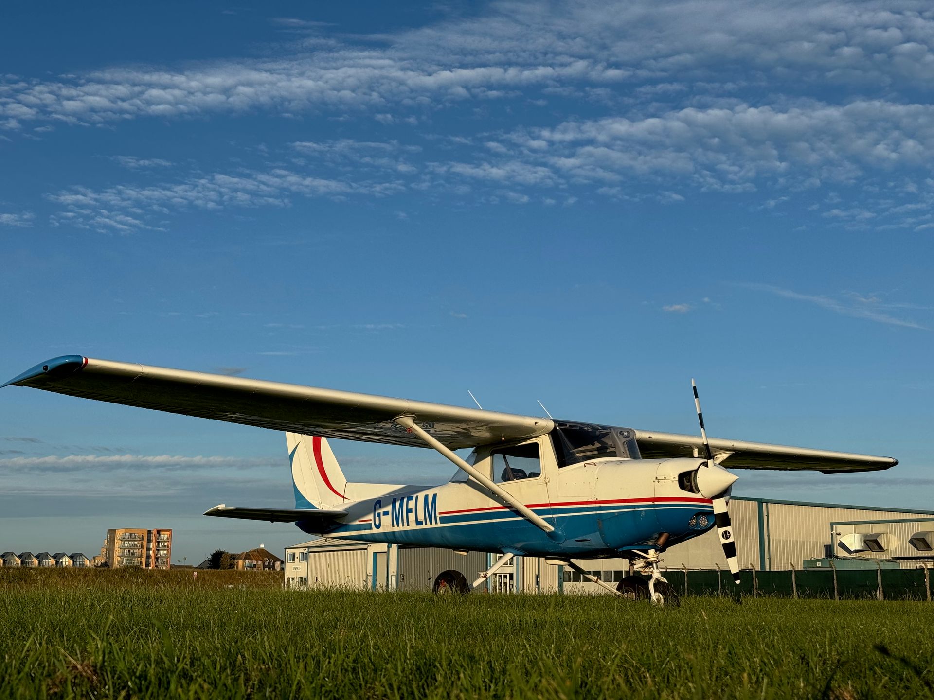 A picture of a STAR Flight Training Cessna 152, G-MFLM at Shoreham Airport